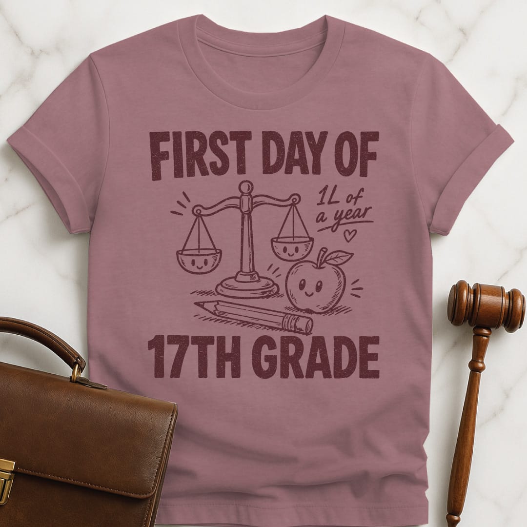 funny law school t-shirt that says First Day of 17th Grade 1L of a year featuring apple scales of justice pencil and a heart in heather mauve