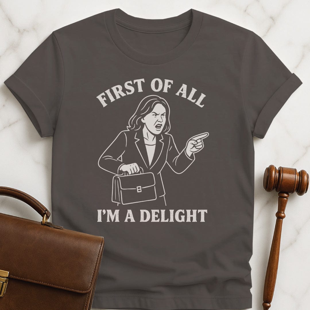 funny attorney graphic t-shirt that says first of all im a delight featuring a woman in a suit screaming in grey