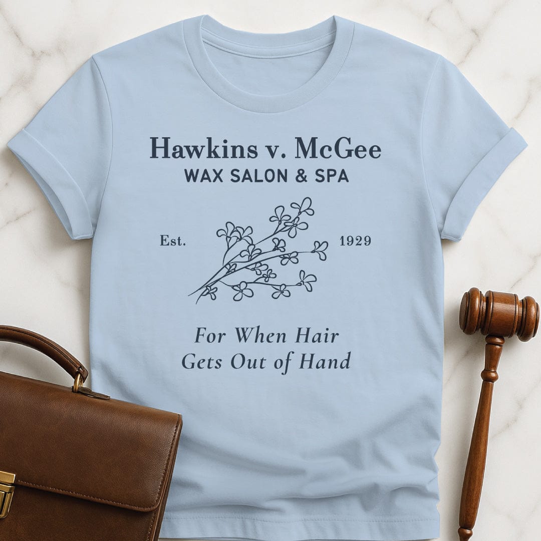 funny law school grad t-shirt that says hawkins v mcgee wax salon and spa featuring branch of flowers in blue