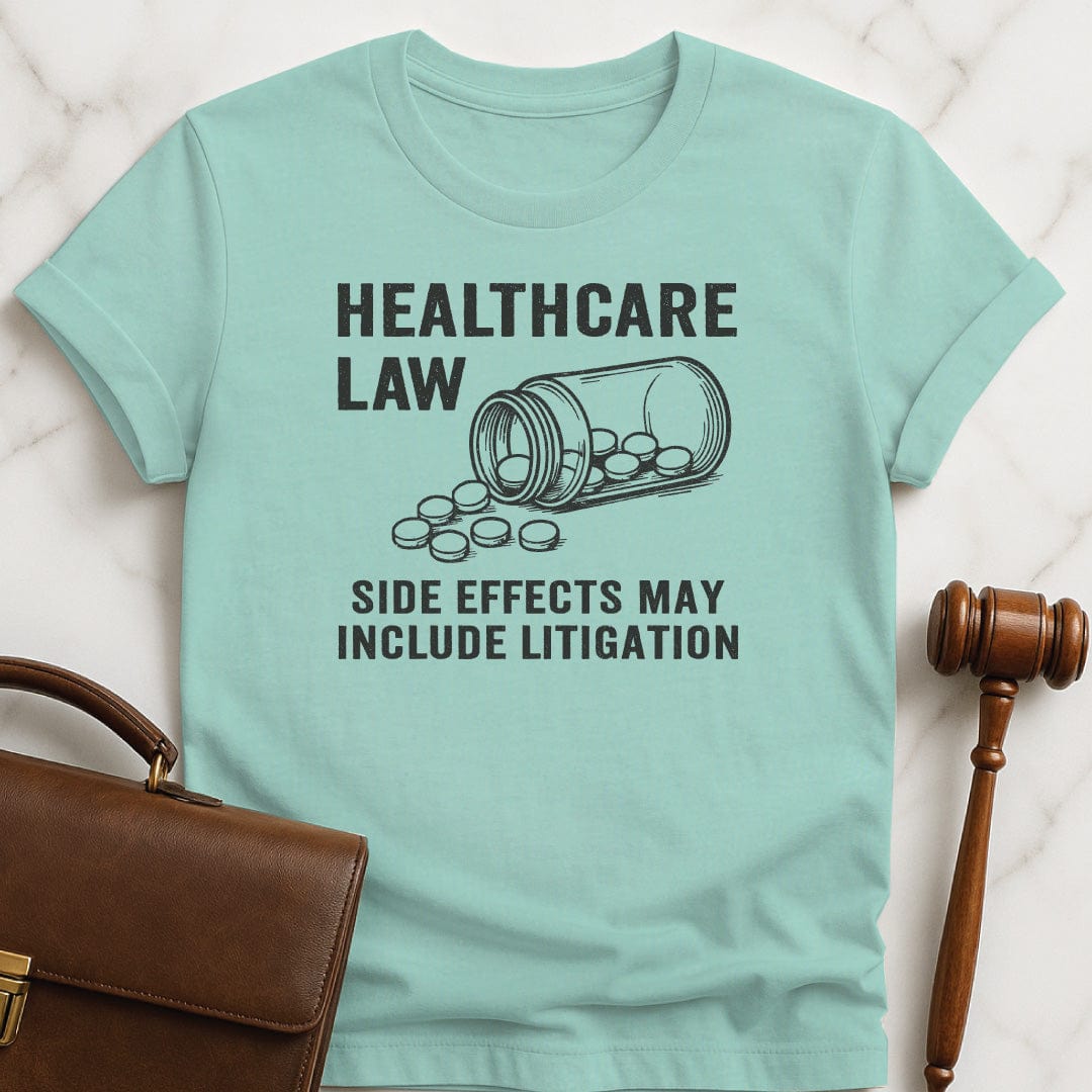 funny law graduate t-shirt that says healthcare law side effects may include litigation featuring open bottle of pills in heather green
