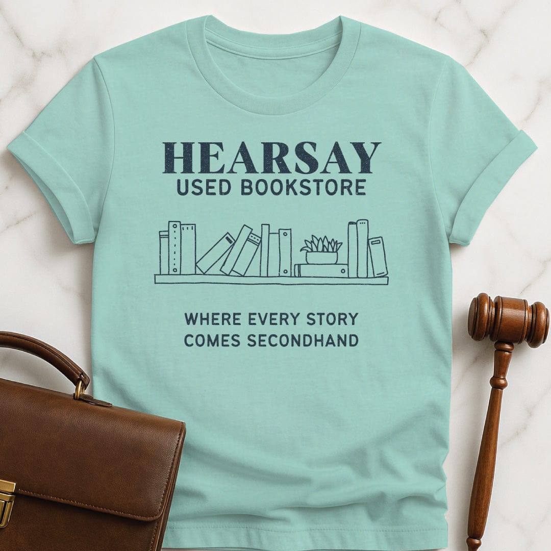 funny new attorney graphic tshirt that says hearsay used bookstore where all stories come secondhand featuring books in heather green