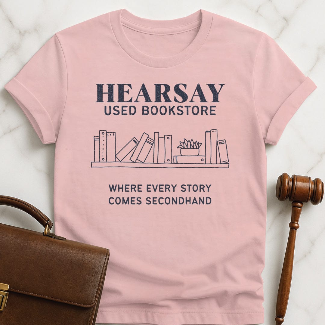 funny law school grad graphic t-shirt that says hearsay used bookstore where all stories come secondhand featuring books in pink