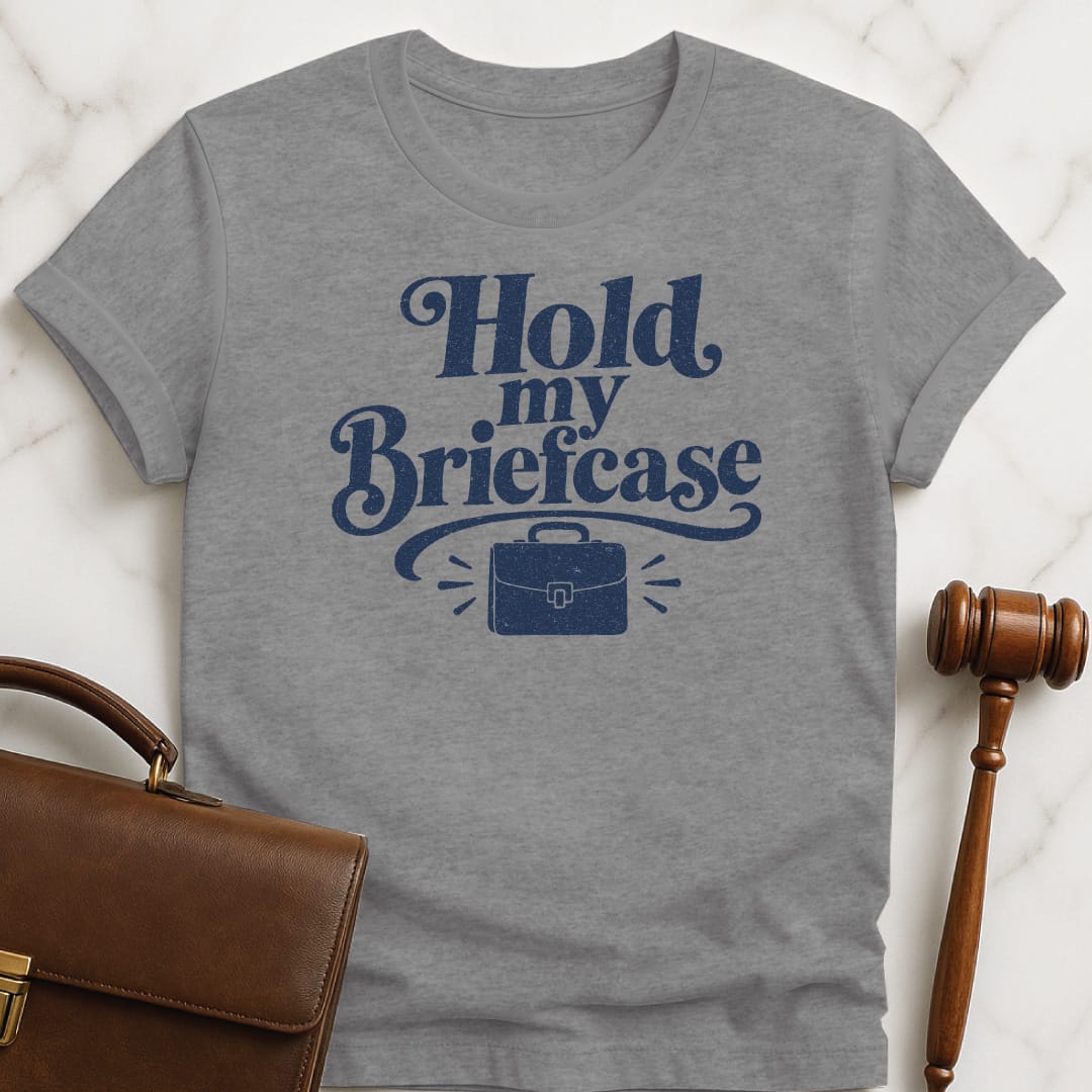 funny law school graduate tshirt that says Hold my briefcase featuring briefcase and flourishes in grey