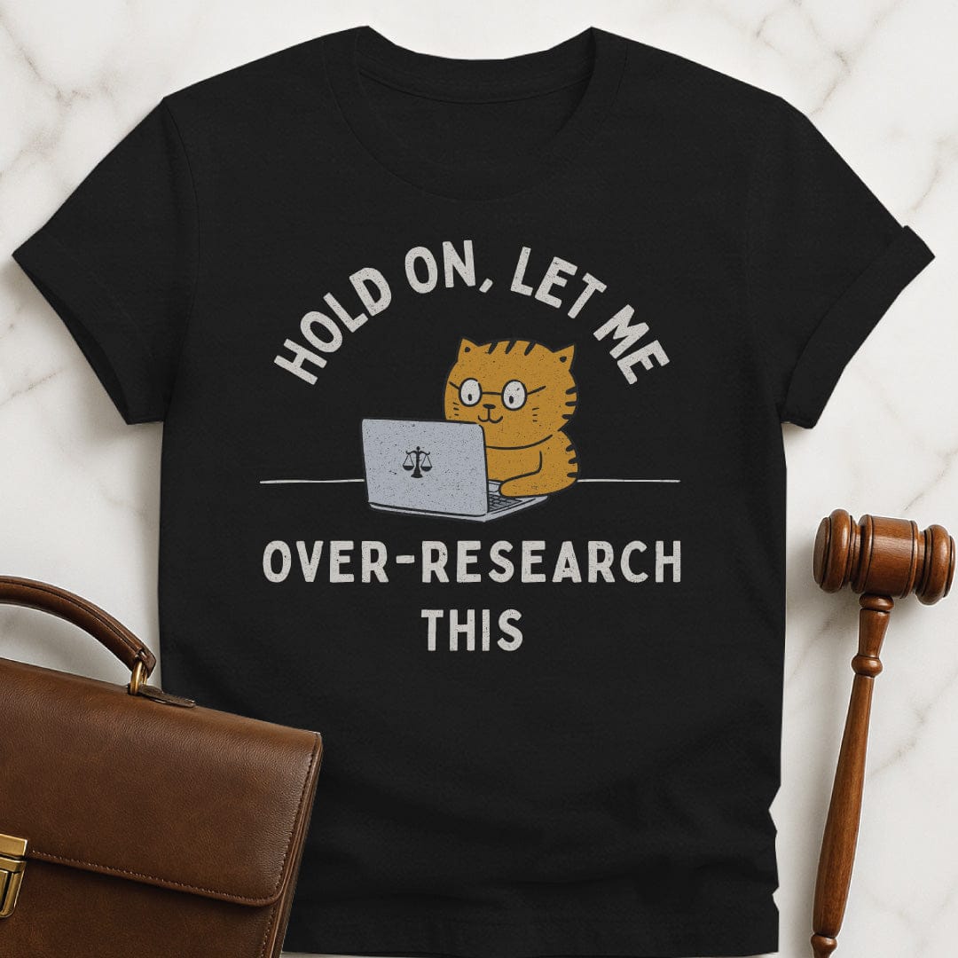 funny law graduate graphic tshirt that says Hold On let me over research this featuring cat using a laptop with a scales of justice in black
