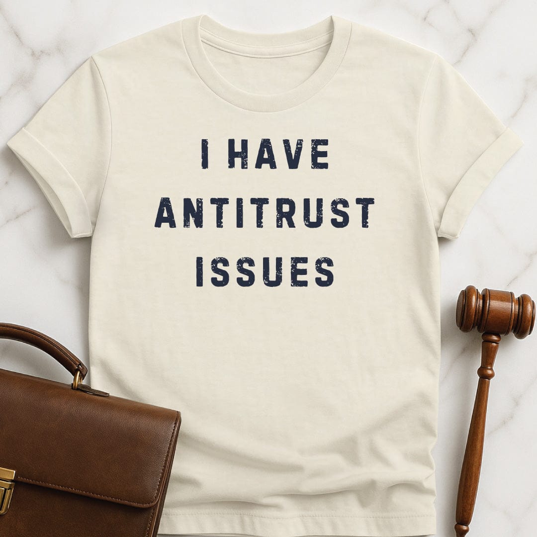 funny law student graphic tshirt that says I have anti trust issues in cream