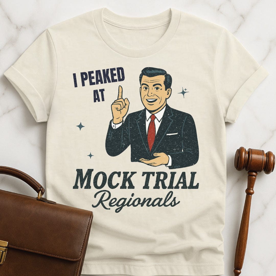 cool law grad t shirt that says i peaked at mock trial regionals featuring a retro man in a suit in cream