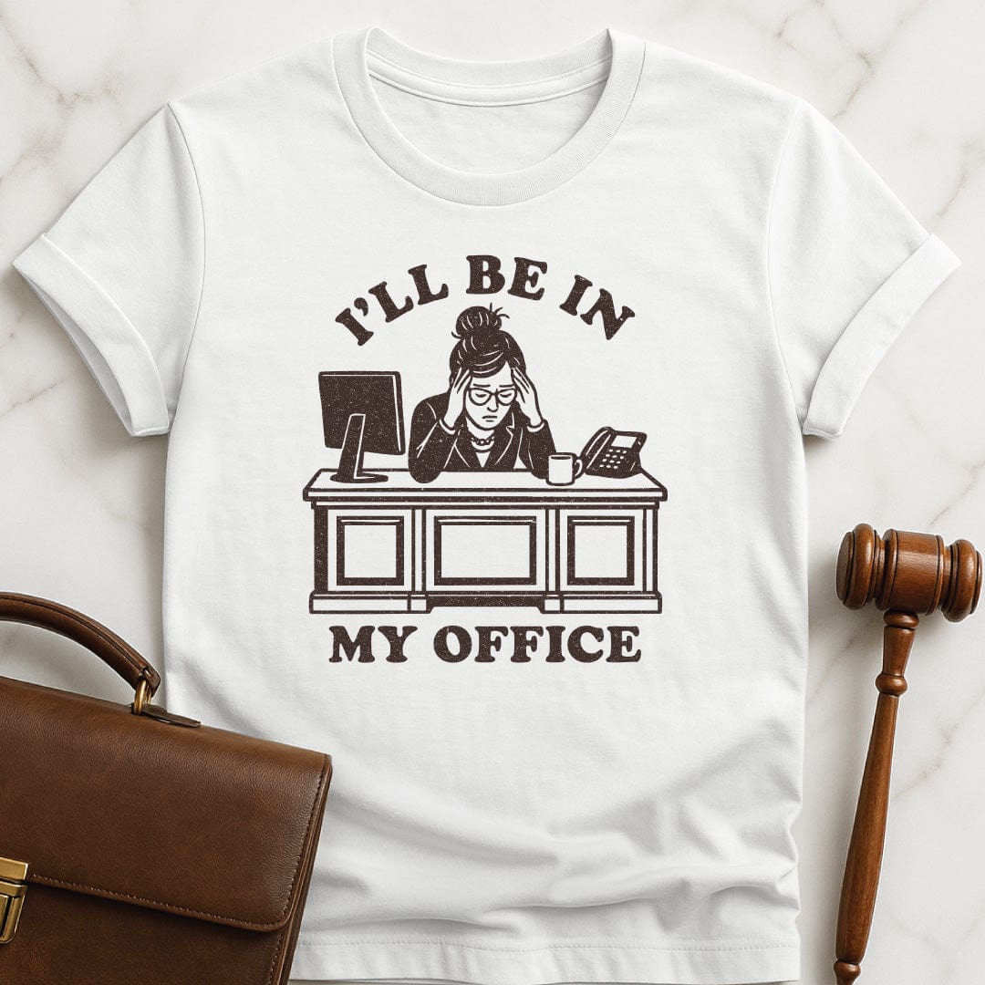 funny law graduate t-shirt that says Ill be in my office featuring woman lawyer slumped over her desk looking stressed out in white