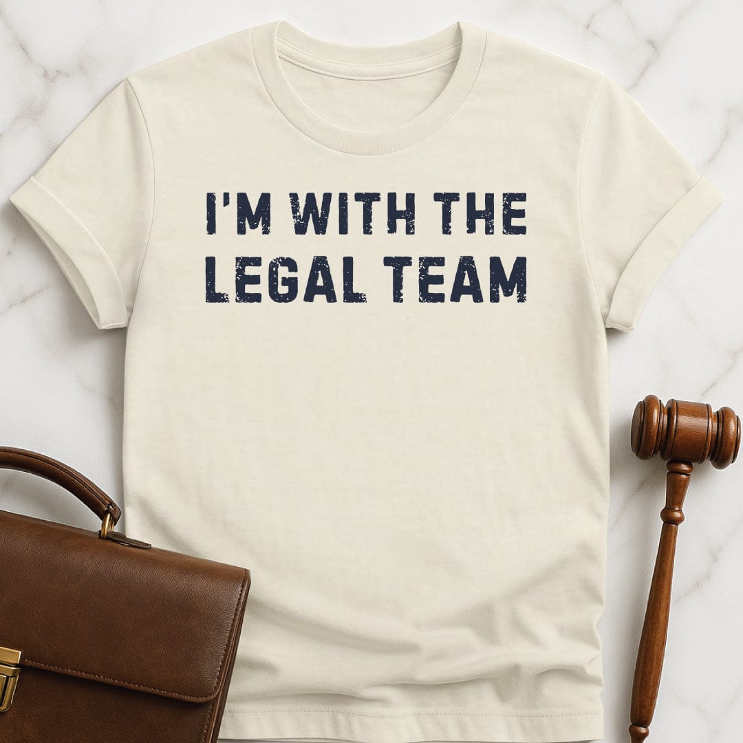 funny attorney tshirt that says Im With the legal Team in cream