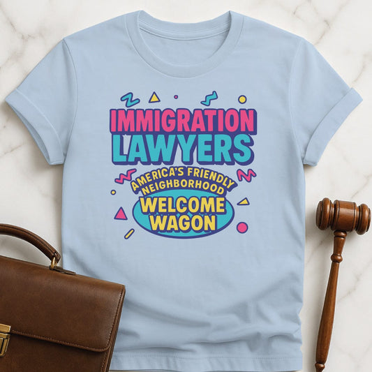 funny attorney graphic t-shirt that says Immigration Lawyers Americas Friendly Neighborhood Welcome Wagon in blue