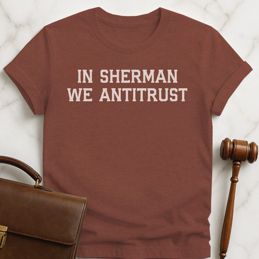 cool law school graphic t shirt that says in sherman we antitrust in heather brown