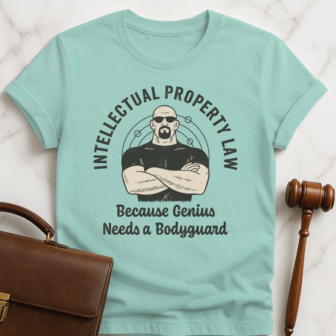 funny law graduate t-shirt that says Intellectual property law because genius needs a bodyguard featuring bodyguard and molecules in heather green