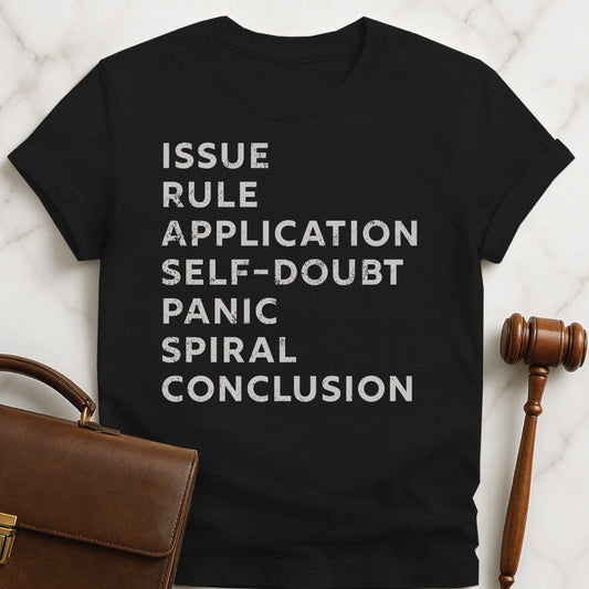 funny law student graphic t-shirt that says issue rule application self doubt panic spiral conclusion in black