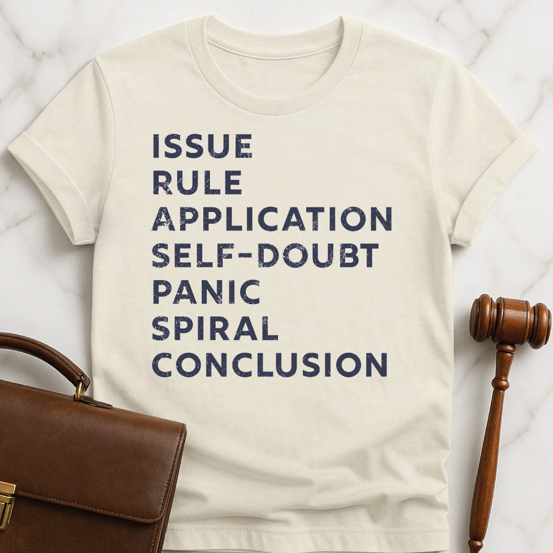 funny law student t-shirt that says issue rule application self doubt panic spiral conclusion in cream