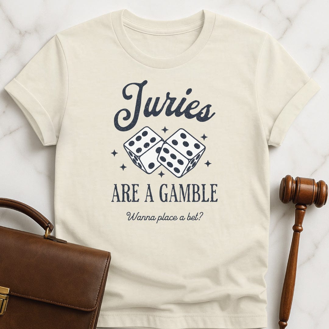 funny lawyer graphic tee that says Juries are a gamble wanna place a bet featuring dice in cream