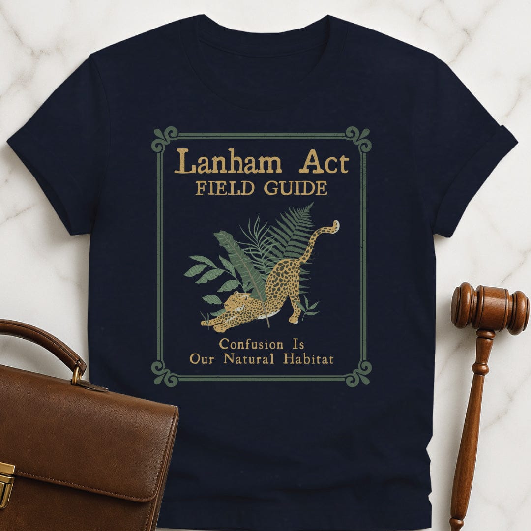 funny attorney graphic t-shirt that says Lanham Act Field Guide confusion is our natural habitat featuring cheetah in the jungle in blue