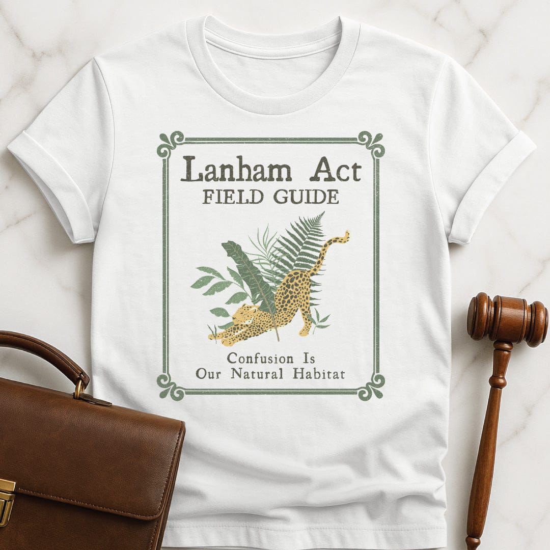 funny attorney tshirt that says Lanham Act Field Guide confusion is our natural habitat featuring cheetah in the jungle in white