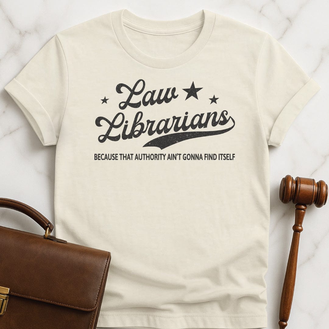 funny lawyer graphic t shirt that says Law Librarians Because That Authority Aint Gonna Find Itself featuring stars in cream