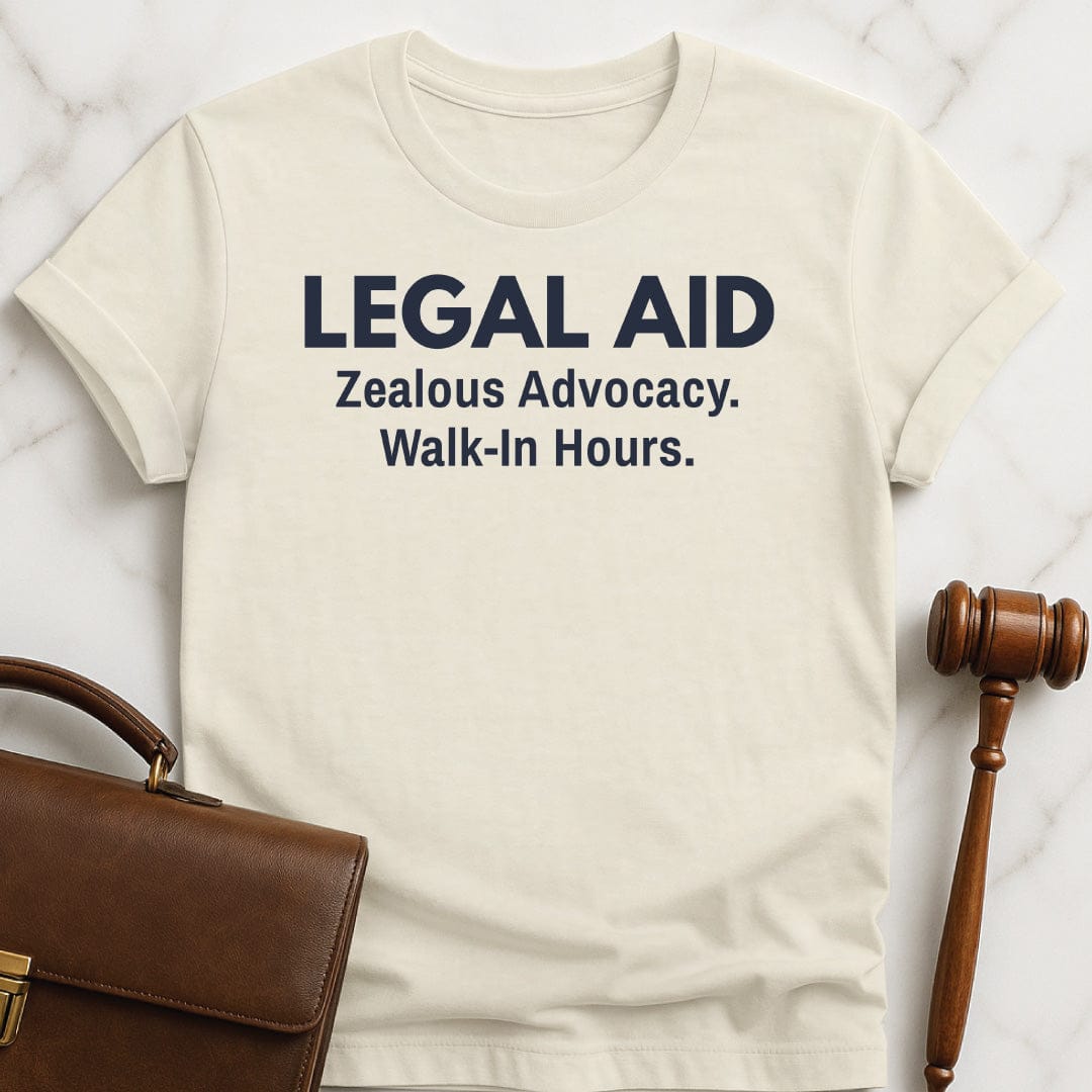funny law graduate t-shirt that says legal aid zealous advocacy walk in hours in cream