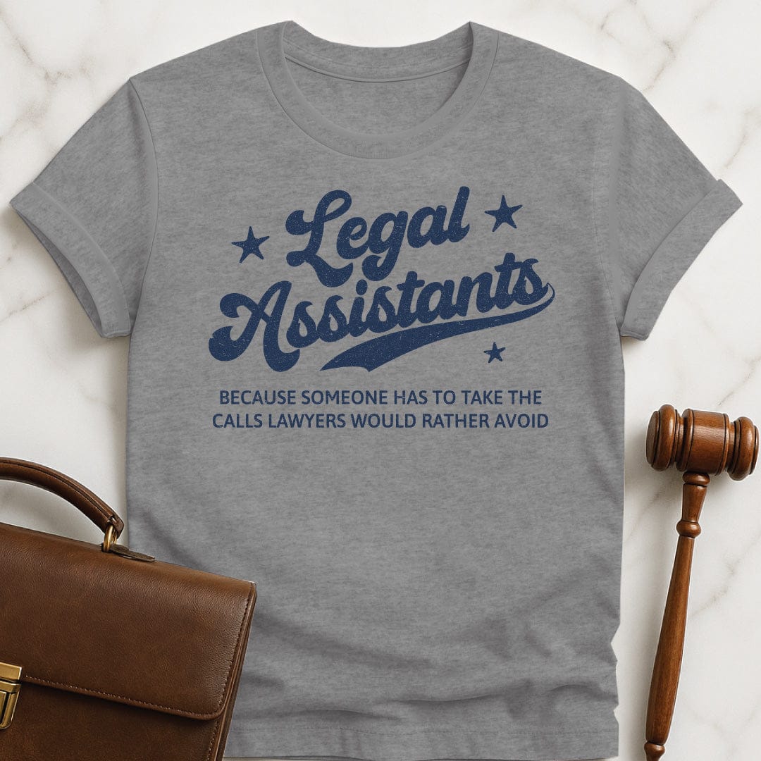 funny lawyer graphic tee that says Legal Assistants Because Someone Has to Take featuring stars in grey