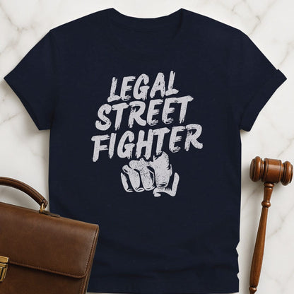 funny law graduate tee that says Legal streetfighter featuring fist in blue