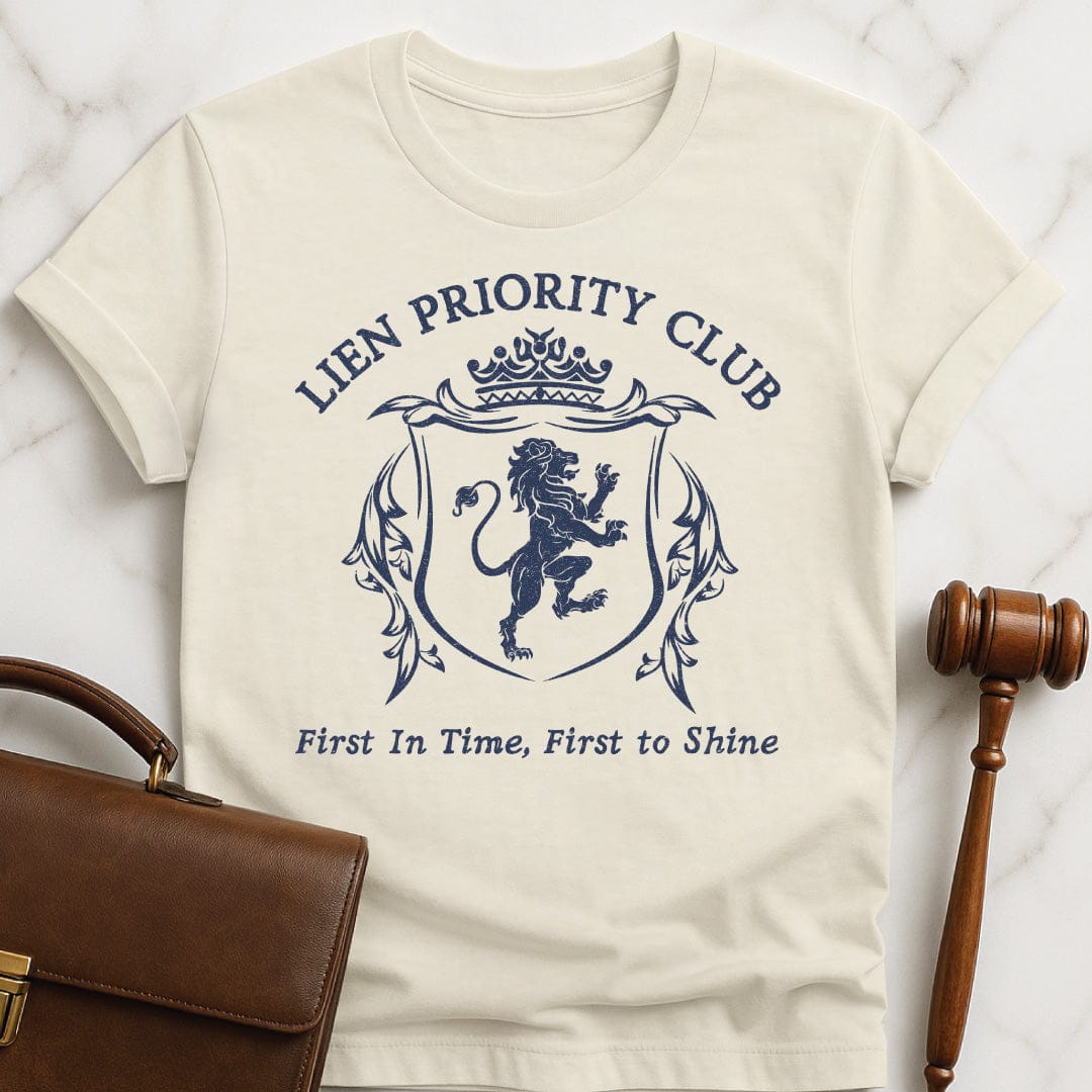 funny new attorney t-shirt that says Lien priority club first in time first to shine featuring crest with a lion in cream