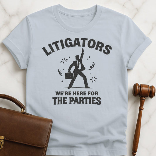 funny attorney graphic tshirt that says litigators were here for the parties featuring man in a suit dancing and confetti in blue