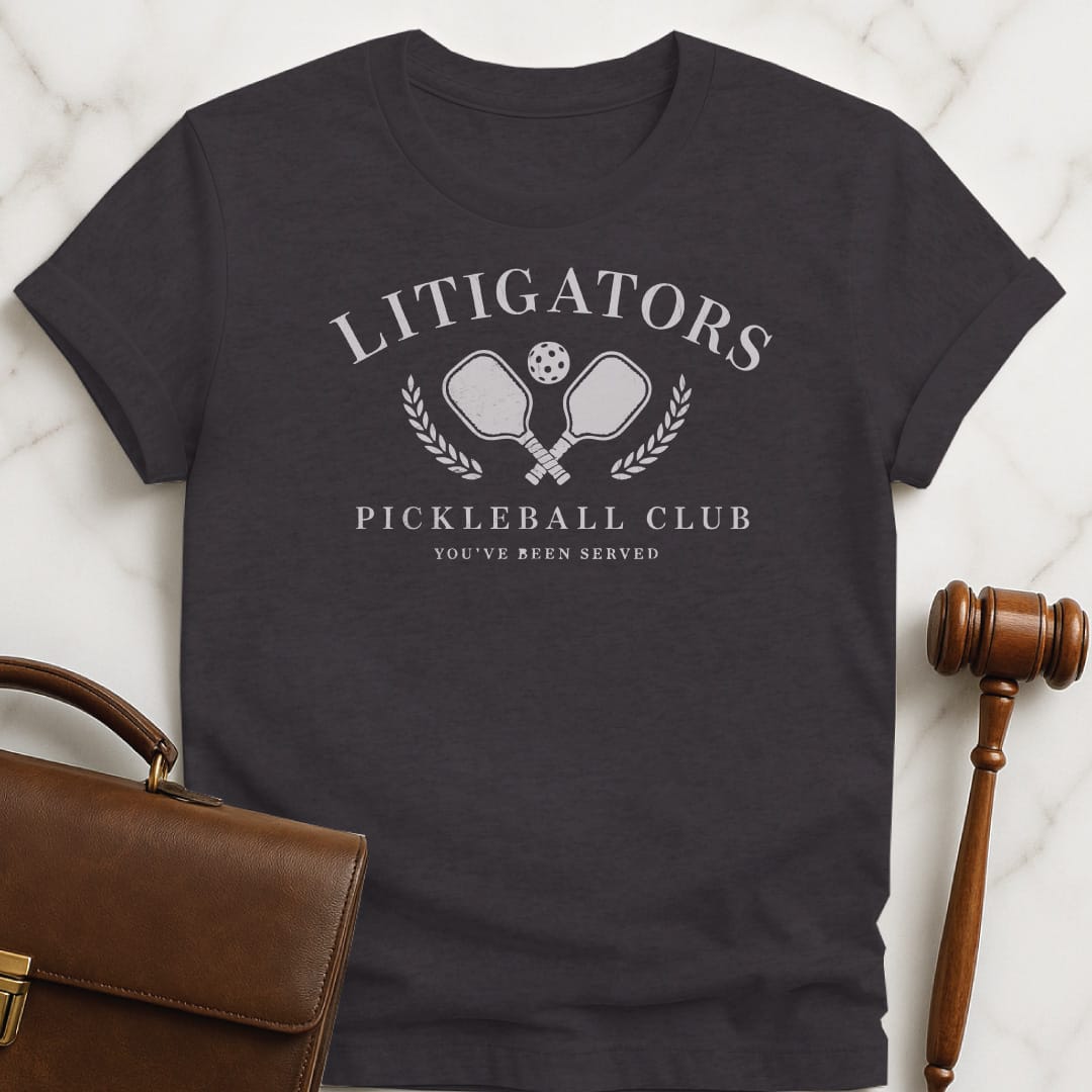 cool law graduate graphic tee that says litigators pickleball club youve been served featuring pickleball paddles and a pickleball ball and a crest in black