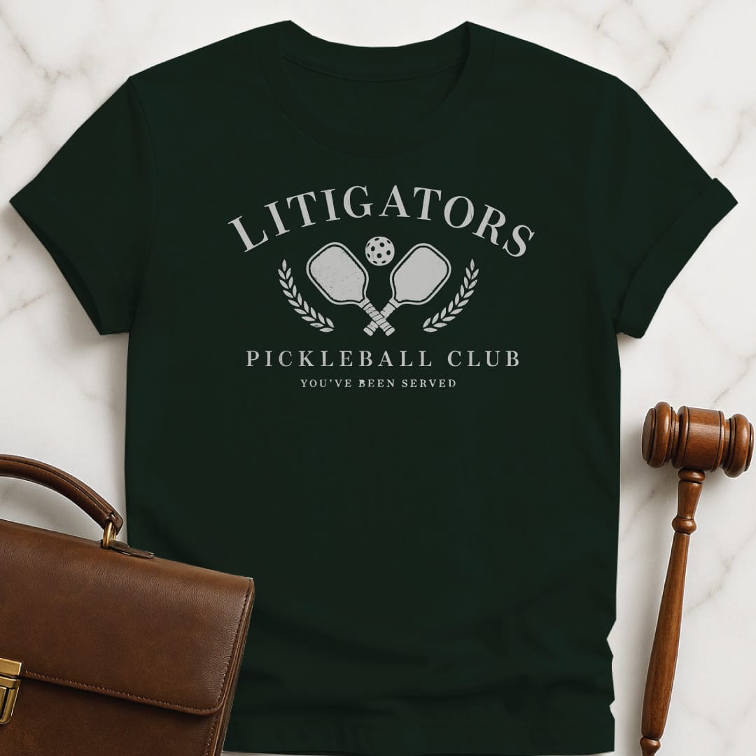 funny law grad graphic t-shirt that says litigators pickleball club youve been served featuring pickleball paddles and a pickleball ball and a crest in green