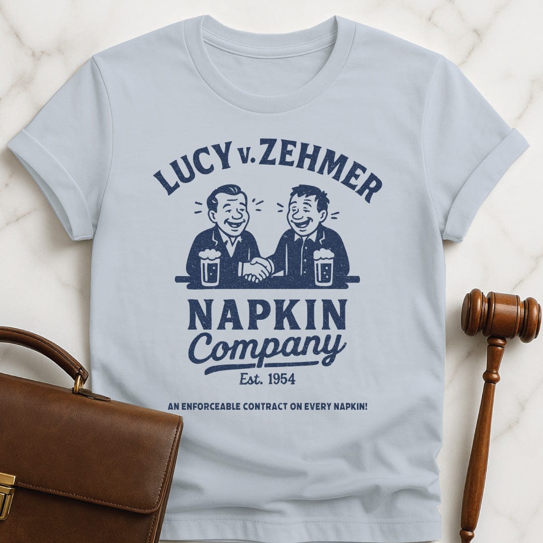 cool law school graphic tee that says Lucy v Zehmer Napkin Company Est 1954 featuring two men drinking beer and shaking hands in blue