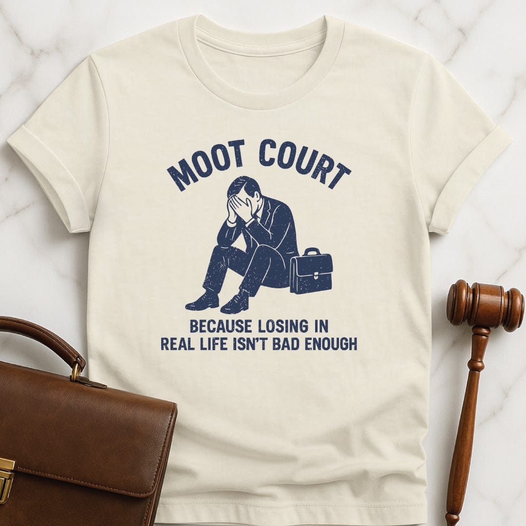 cool law school graphic t shirt that says Moot Court Because Losing in Real life Isnt Bad Enough featuring man in suit and briefcase looking sad in cream