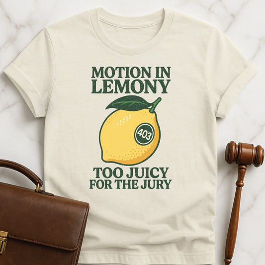 funny attorney graphic tshirt that says motion in lemony too juicy for the jury 403 featuring a farmstand-style lemon with a 403 sticker in cream