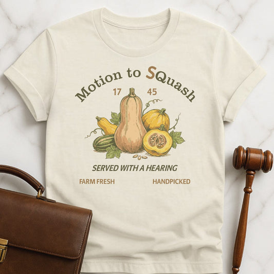 funny law graduate tshirt that says Motion to quash with s added in featuring squash in cream