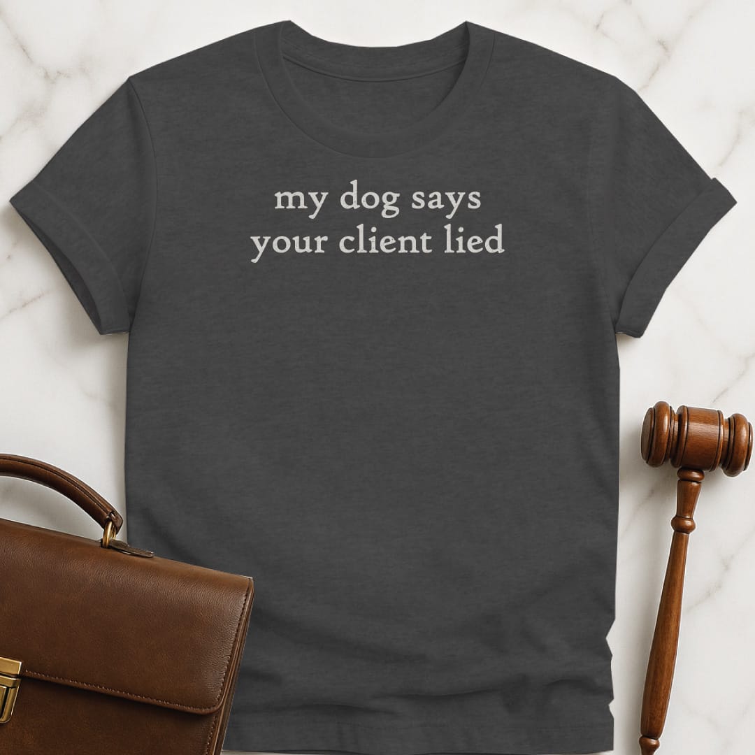 funny lawyer graphic t-shirt that says my dog says your client lied in grey