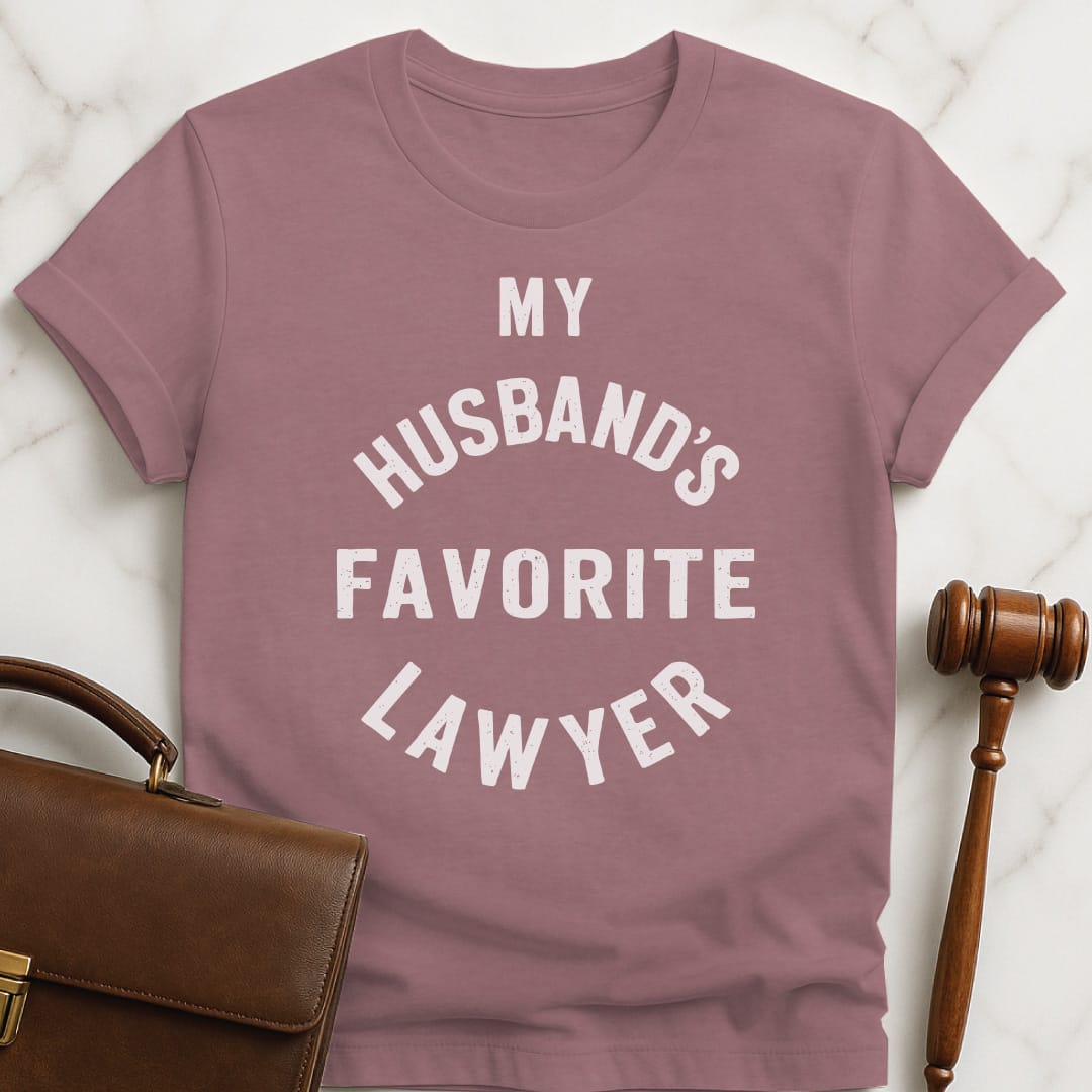 cool law grad graphic t-shirt that says my husbands favorite lawyer in heather mauve