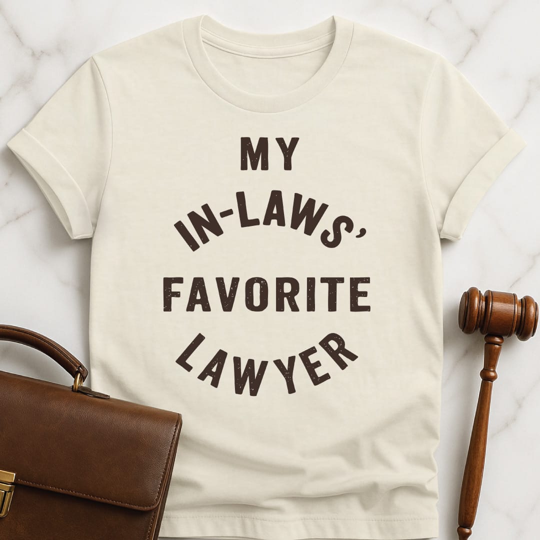cool law school graduate graphic tshirt that says my in laws favorite lawyer in cream