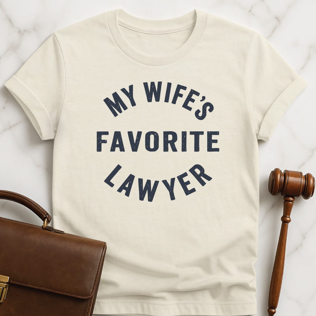 cool law school graduate graphic tshirt that says my wifes favorite lawyer in cream