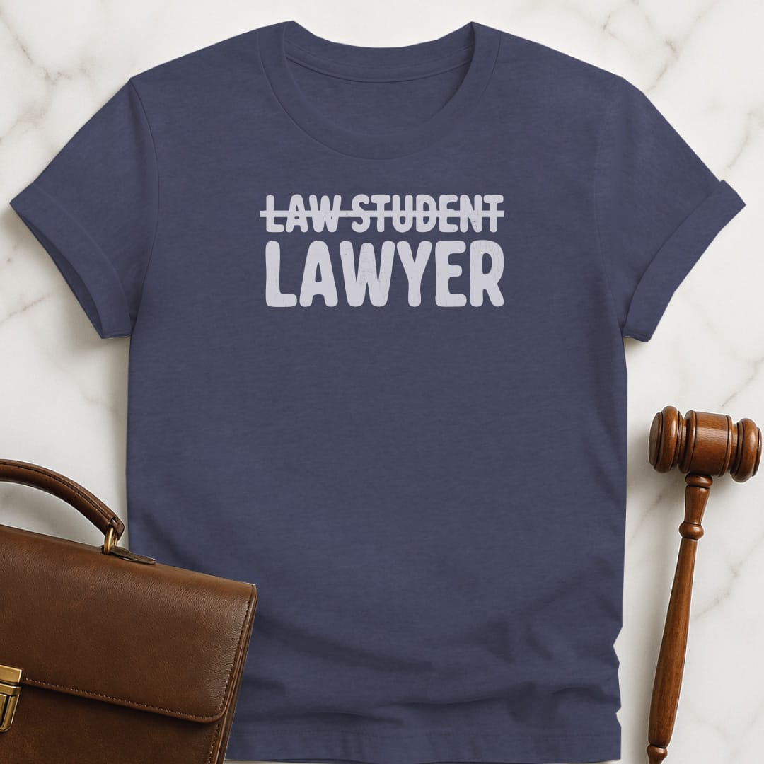 cool new attorney t shirt that says Law student crossed out lawyer in heather blue