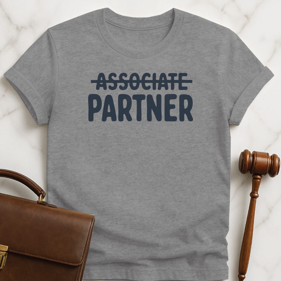 cool attorney tee that says Associate crossed out partner in grey