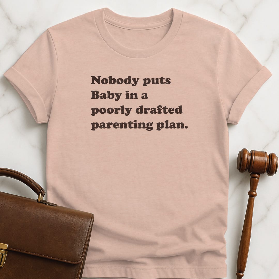 funny new attorney graphic t-shirt that says Nobody puts baby in a poorly drafted parenting plan in heather peach