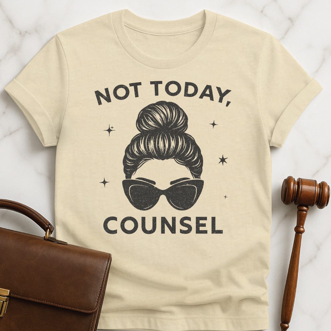 funny attorney graphic t-shirt that says not today counsel featuring a drawing of a woman with hair and glasses in cream