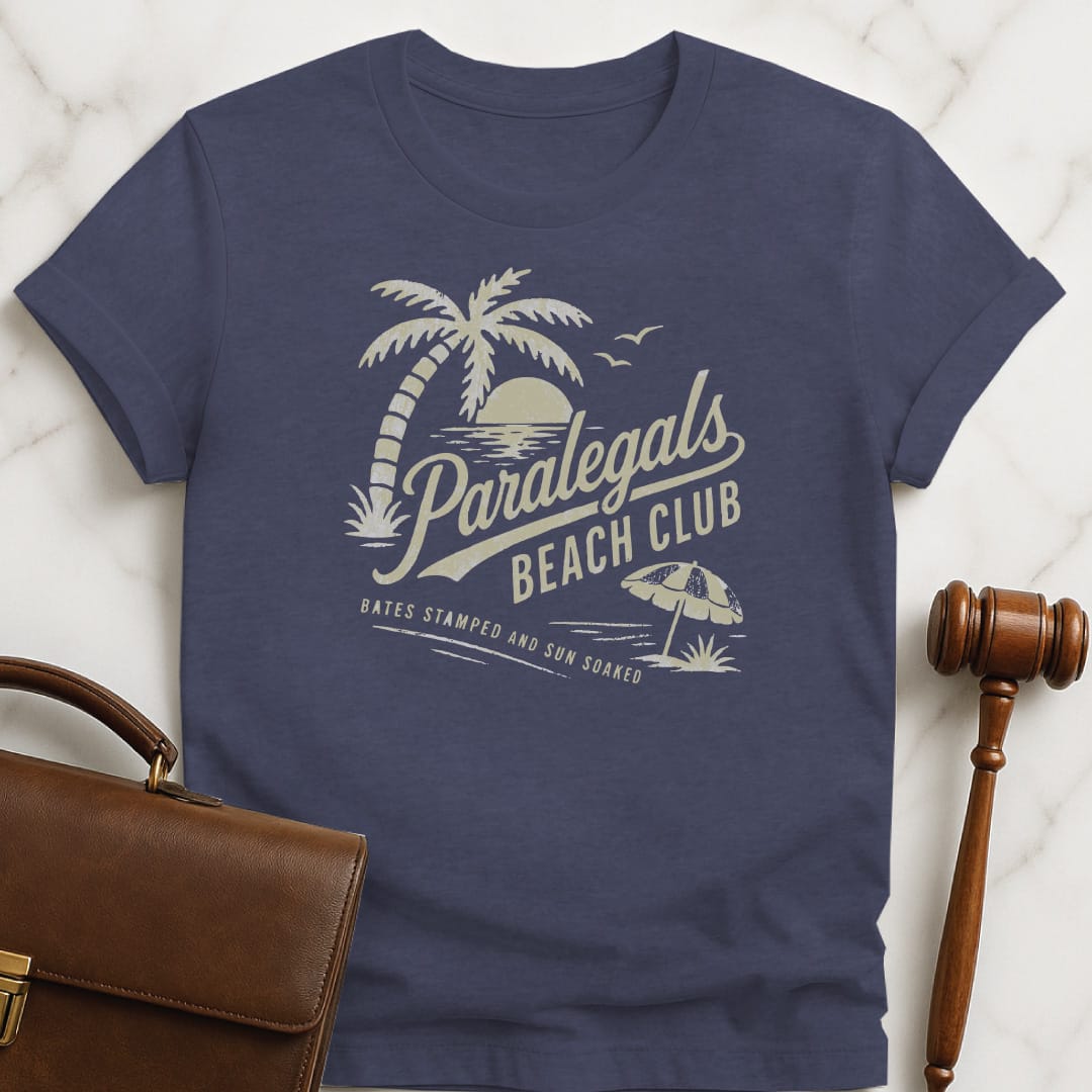 cool attorney tee that says paralegals beach club bates stamped and sun soaked featuring beach scene in heather blue