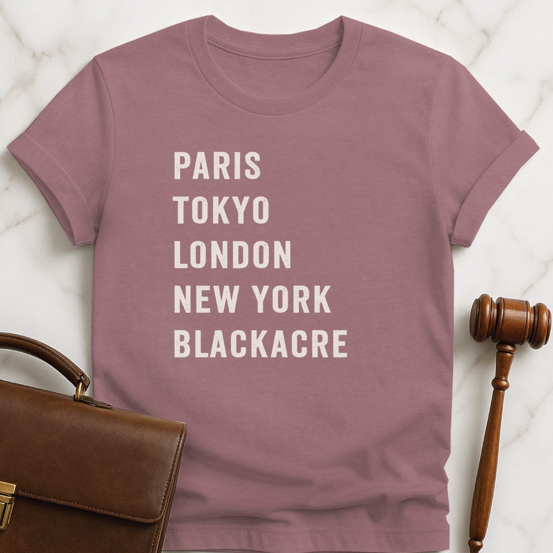 humorous law grad graphic tee that says Paris Tokyo London New York Blackacre in heather mauve
