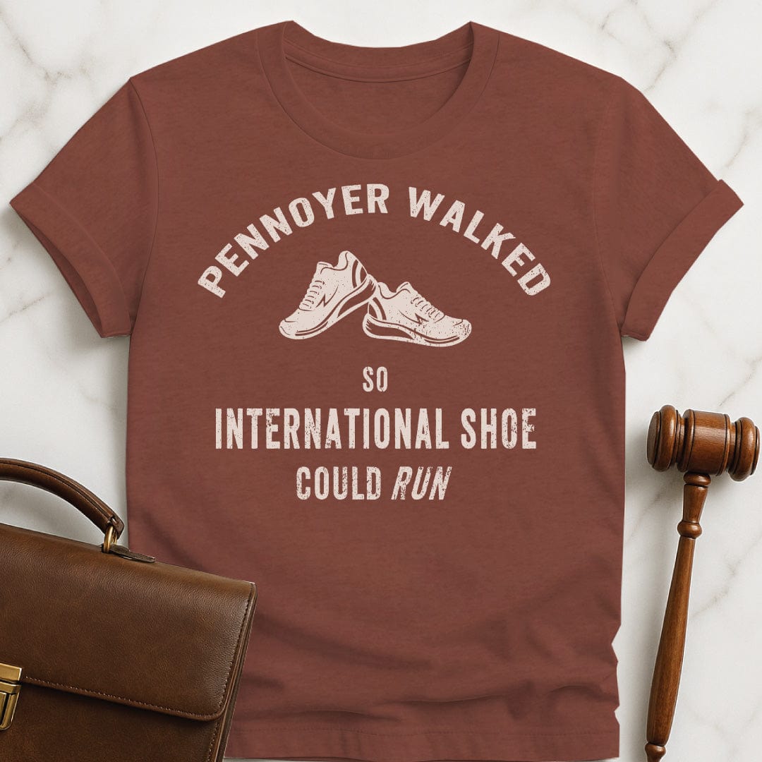 nerdy lawyer graphic t shirt that says pennoyer walked so international shoe could run featuring vintage style sneakers in heather brown
