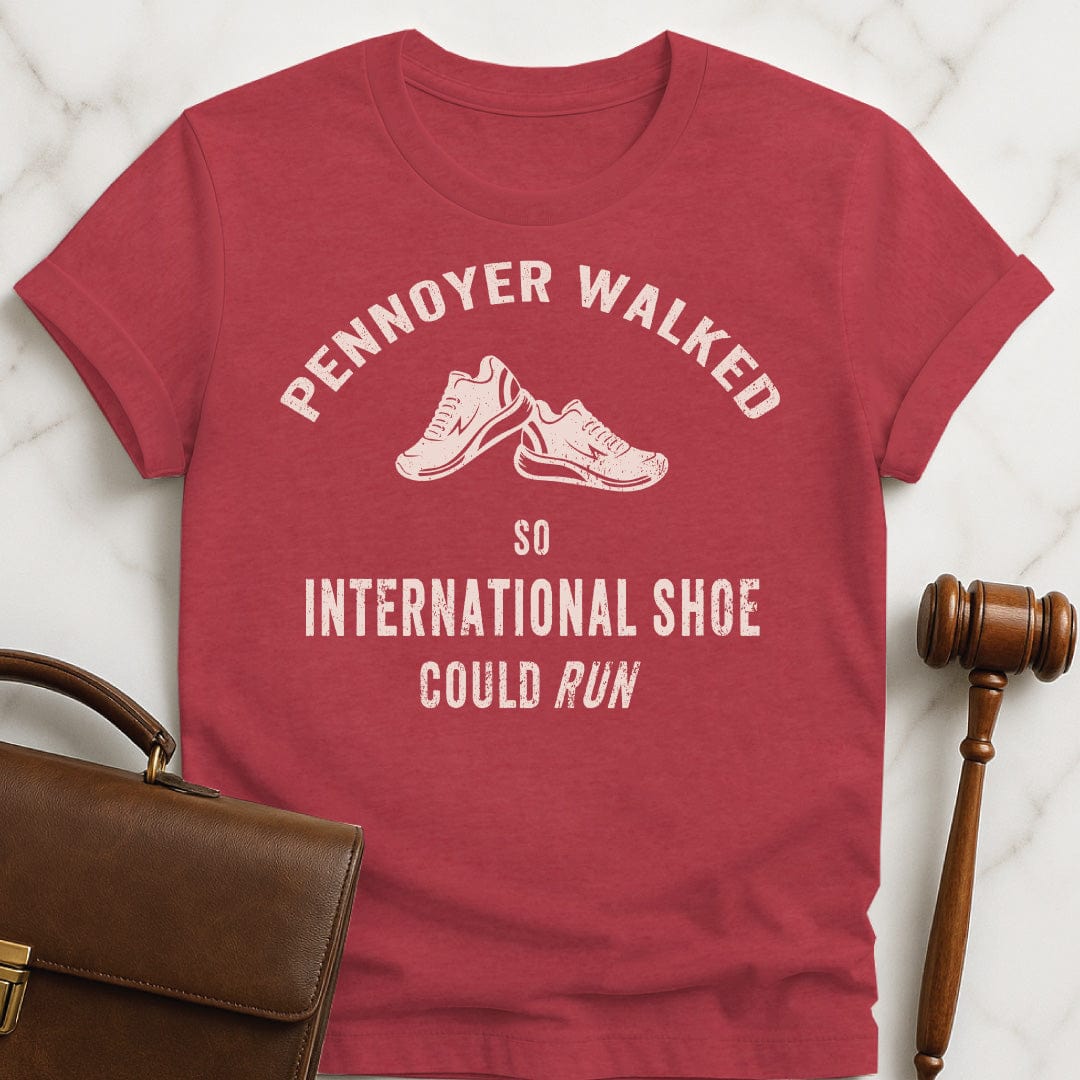 funny law school grad graphic tshirt that says pennoyer walked so international shoe could run featuring vintage style sneakers in heather red