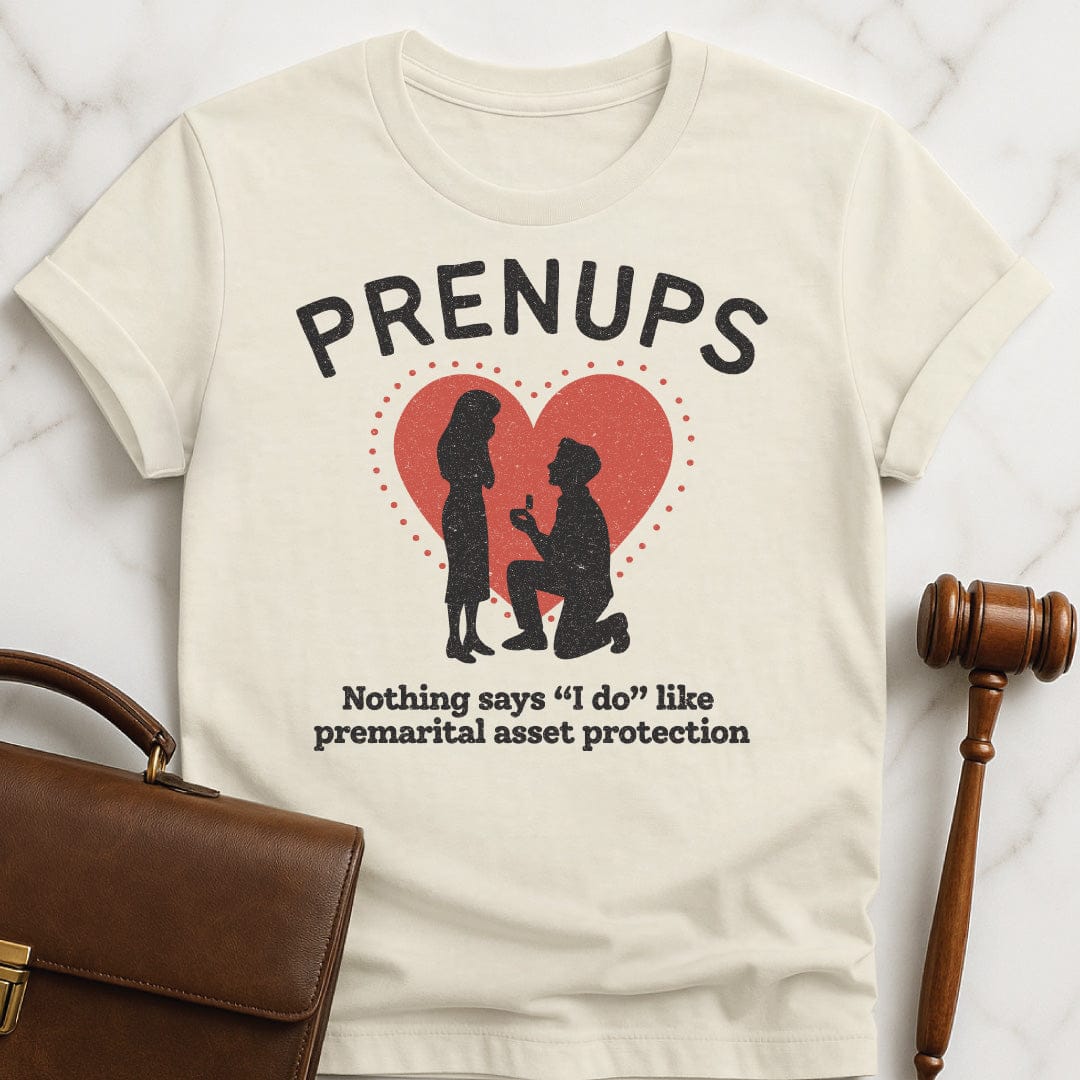 funny law student t-shirt that says Prenups Nothing Says I Do Like Premarital Asset Protection featuring Man proposing to woman with a heart in cream