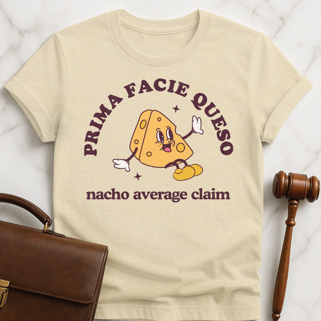 funny law student graphic t-shirt that says Prima Facie Queso Nacho Average Claim in cream