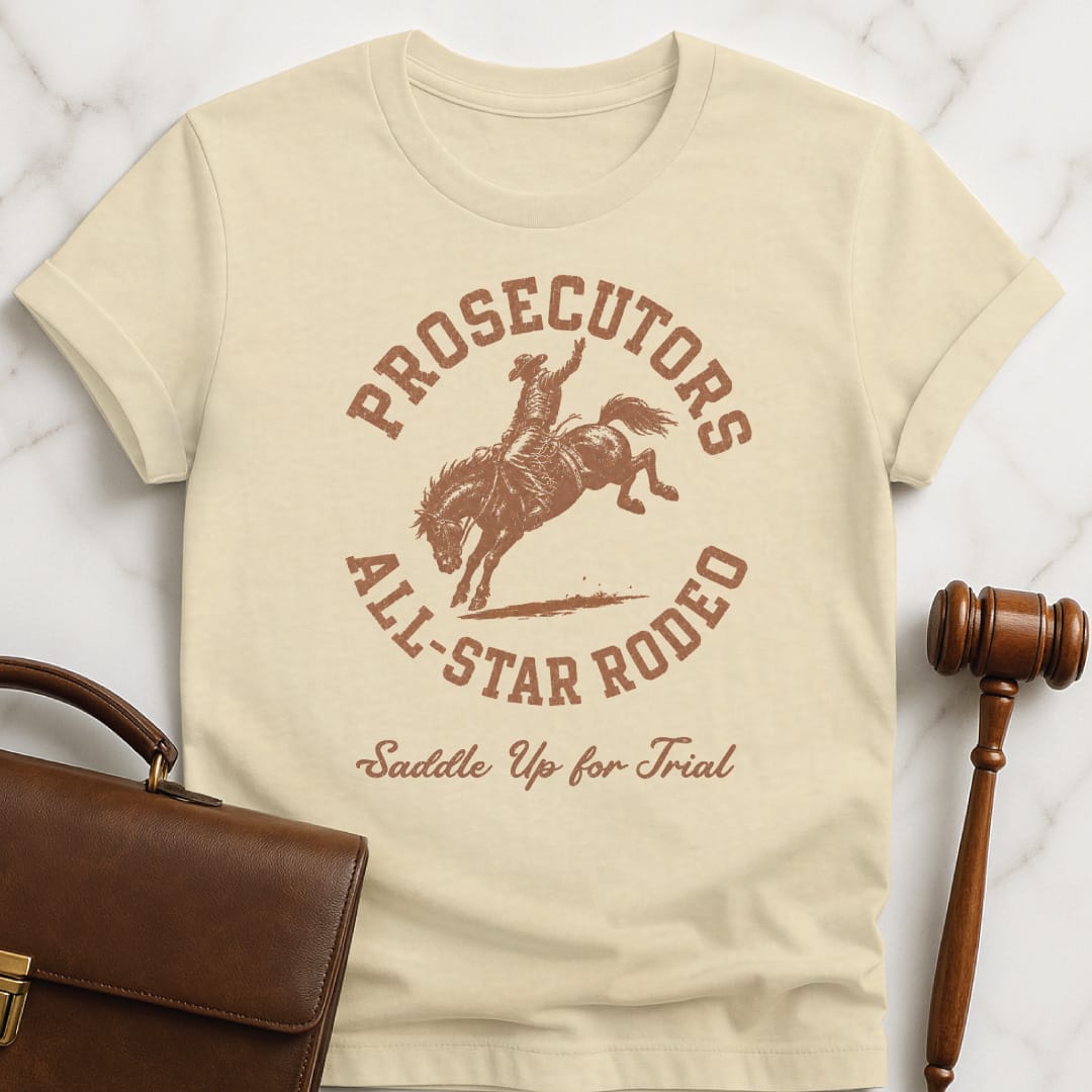 funny law school t-shirt that says prosecutors all star rodeo saddle up for trial featuring rodeo image in cream
