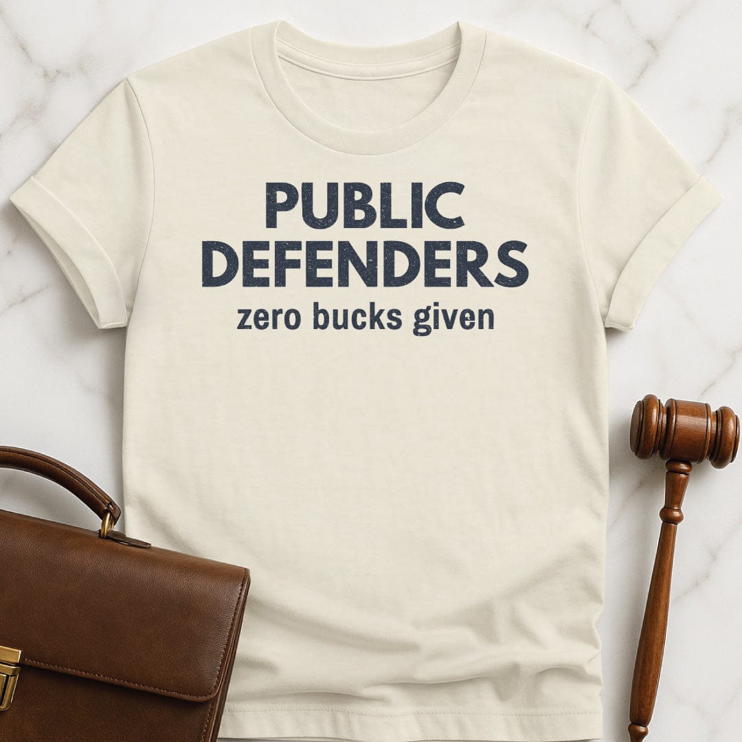 funny attorney graphic tshirt that says Public defenders zero bucks given in cream