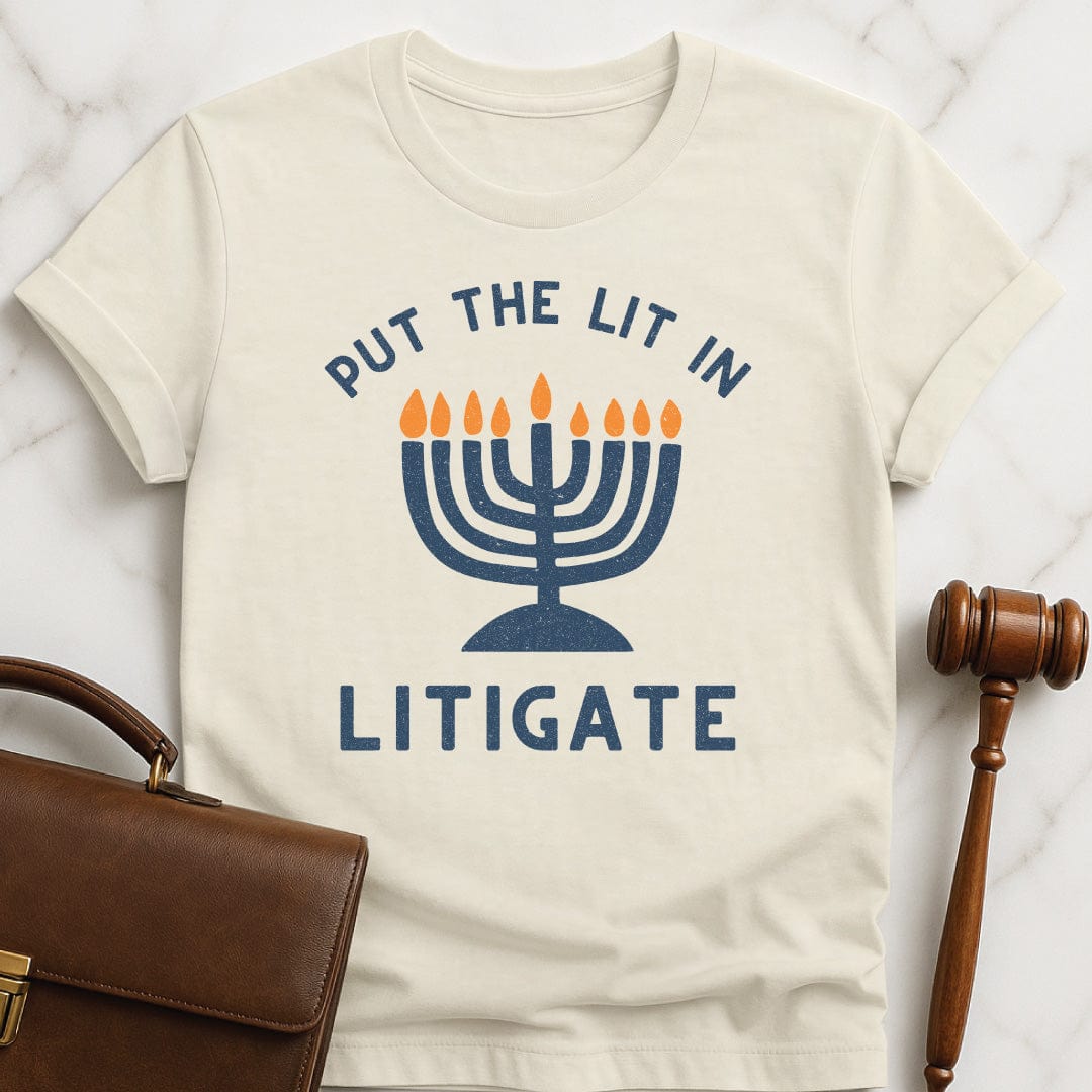 hanukkah new lawyer graphic t shirt that says Put the Lit in Litigate featuring hanukkah menorah in cream