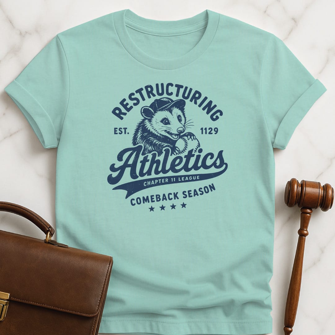 cool lawyer graphic t shirt that says Restructuring Athletics est 1129 comeback season chapter 11 league featuring possum with a baseball hat and baseball in heather green